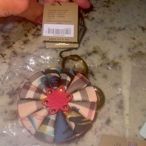 Burberry Flower charm. Plum pink